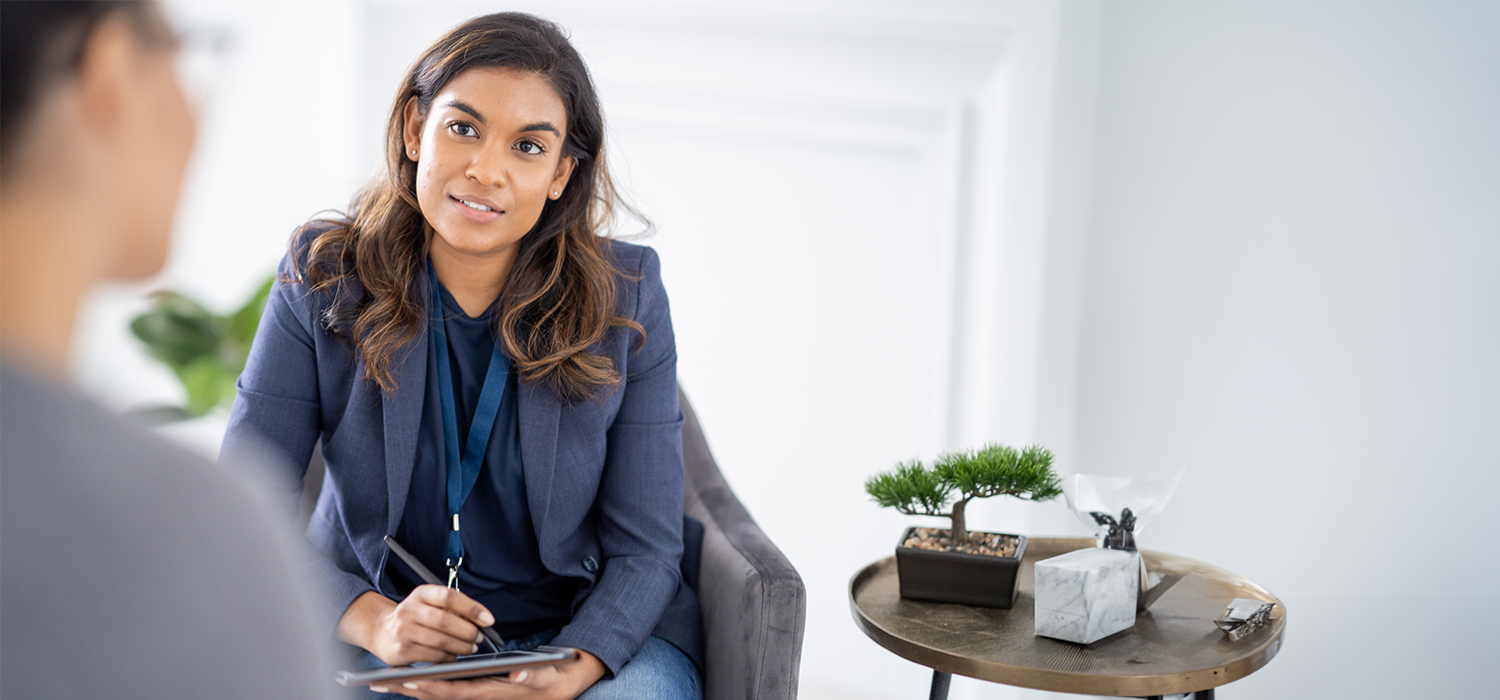 a counsellor listening to an unidentified client