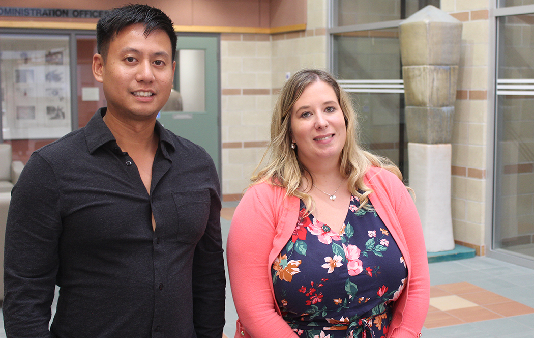 Raymond Chhun and Katelyn Smallwood-MacDonald at the College of Nursing's atrium.