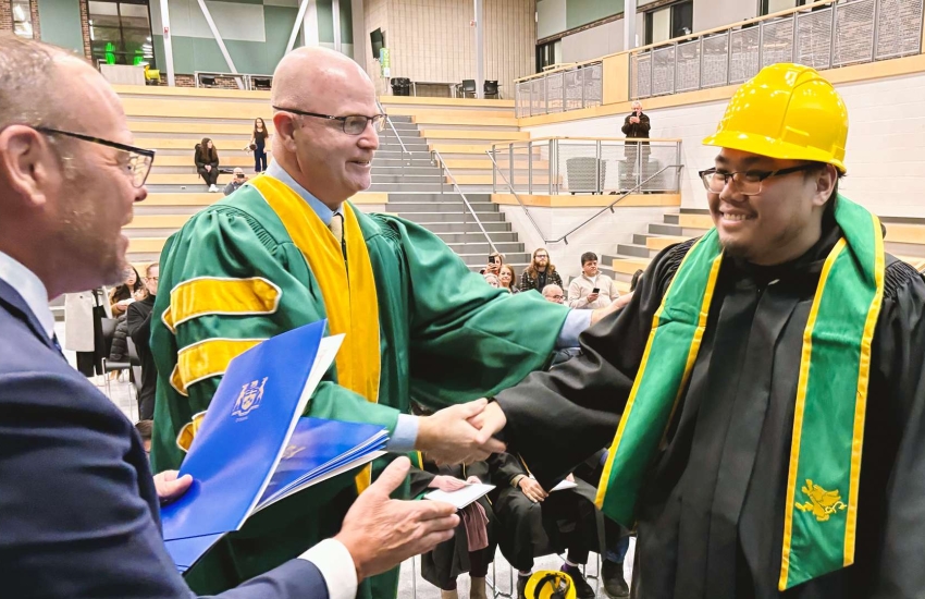 A graduate of the Battery Manufacturing Certificate program at St. Clair College receives his certificate