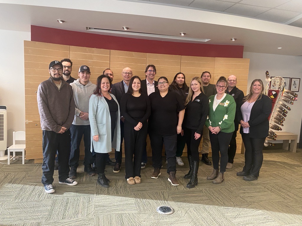 Group shot of RRC Polytech staff and students with Lenovo account executive Warren Beleyowski.