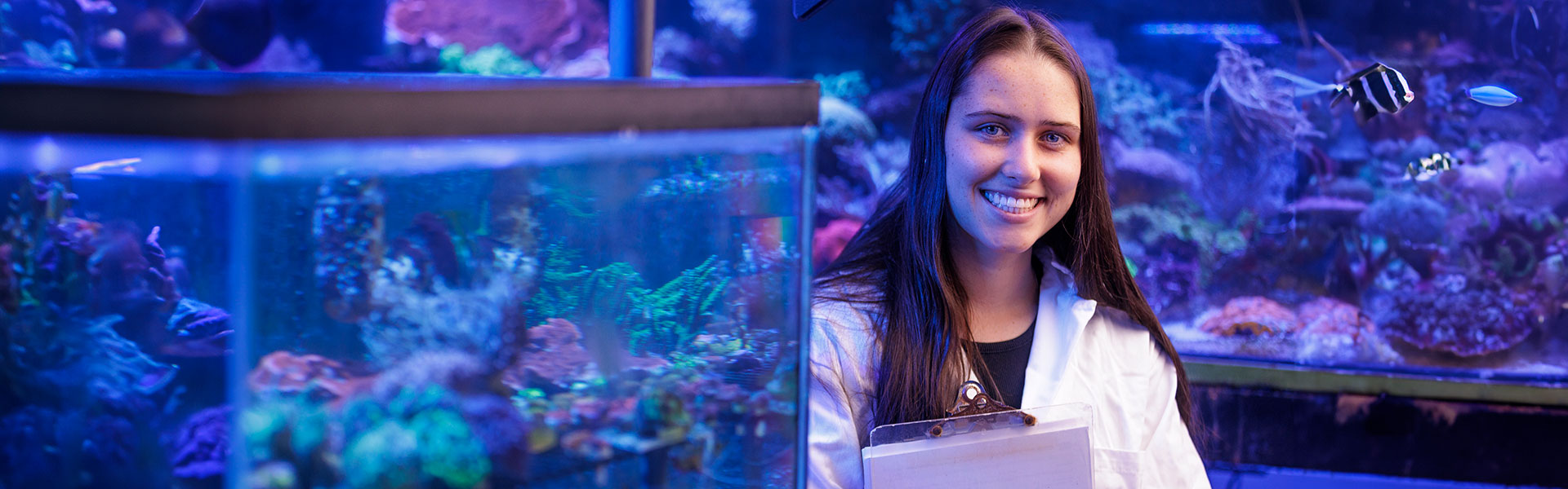 U of G student in an aqua lab